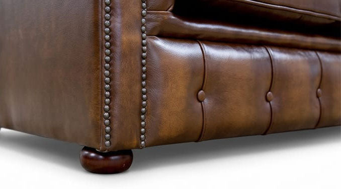 Cambridge Chesterfield Sofa base with buttoned front panel and turned wooden bun foot
