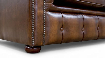 Cambridge Chesterfield Sofa base with buttoned front panel and turned wooden bun foot