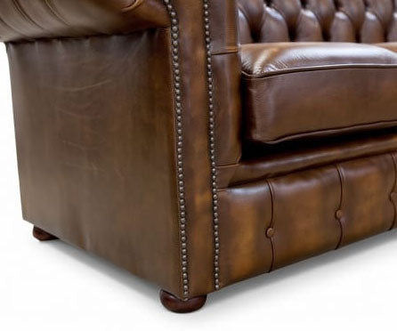 Cambridge Chesterfield Sofa side view showing arm, seat cushion and studded front